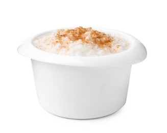 Photo of Delicious rice pudding with cinnamon isolated on white