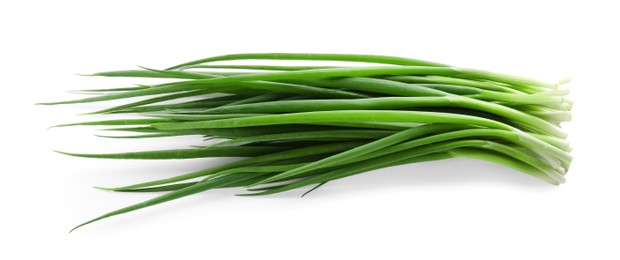 Photo of Many fresh green onions isolated on white