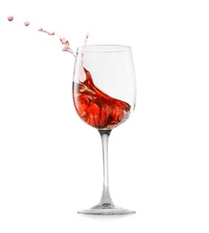 Photo of Rose wine splashing in glass on white background