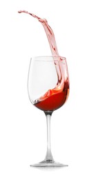 Photo of Rose wine splashing in glass on white background