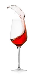 Photo of Rose wine splashing in glass on white background