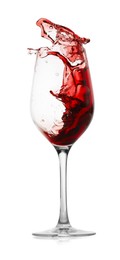 Photo of Red wine splashing in glass on white background