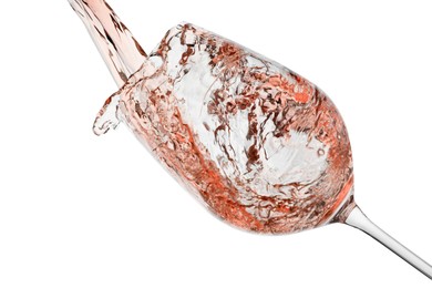 Photo of Pouring rose wine into glass on white background