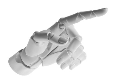 Photo of Artificial intelligence. Robot hand pointing at something on white background