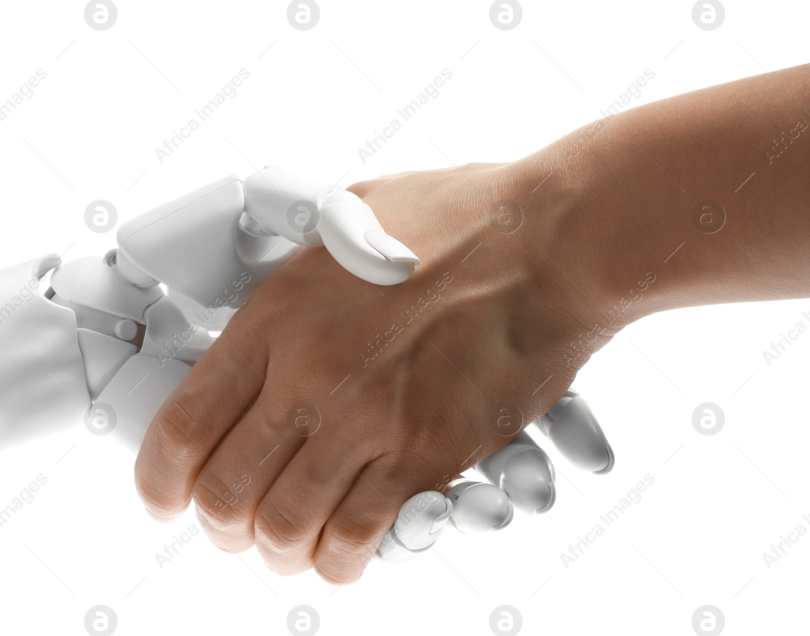 Photo of Artificial intelligence. Woman shaking hands with robot on white background, closeup