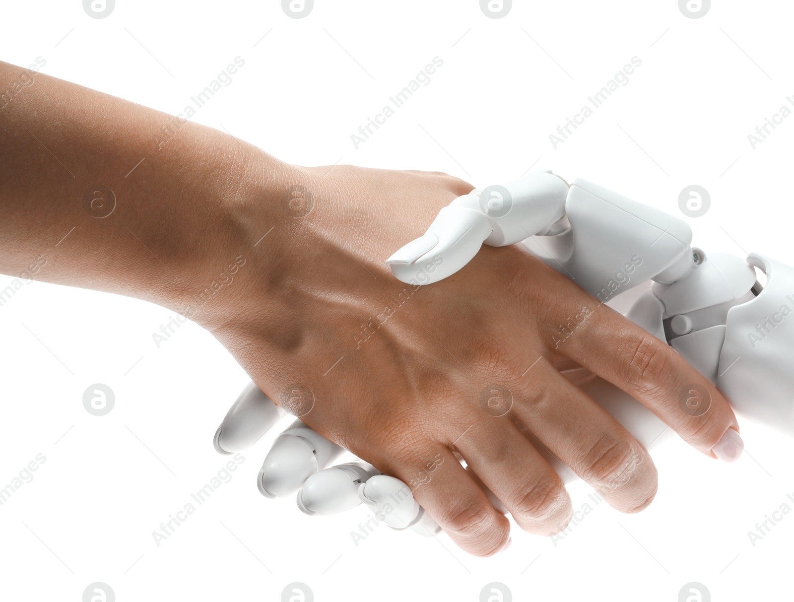 Photo of Artificial intelligence. Woman shaking hands with robot on white background, closeup