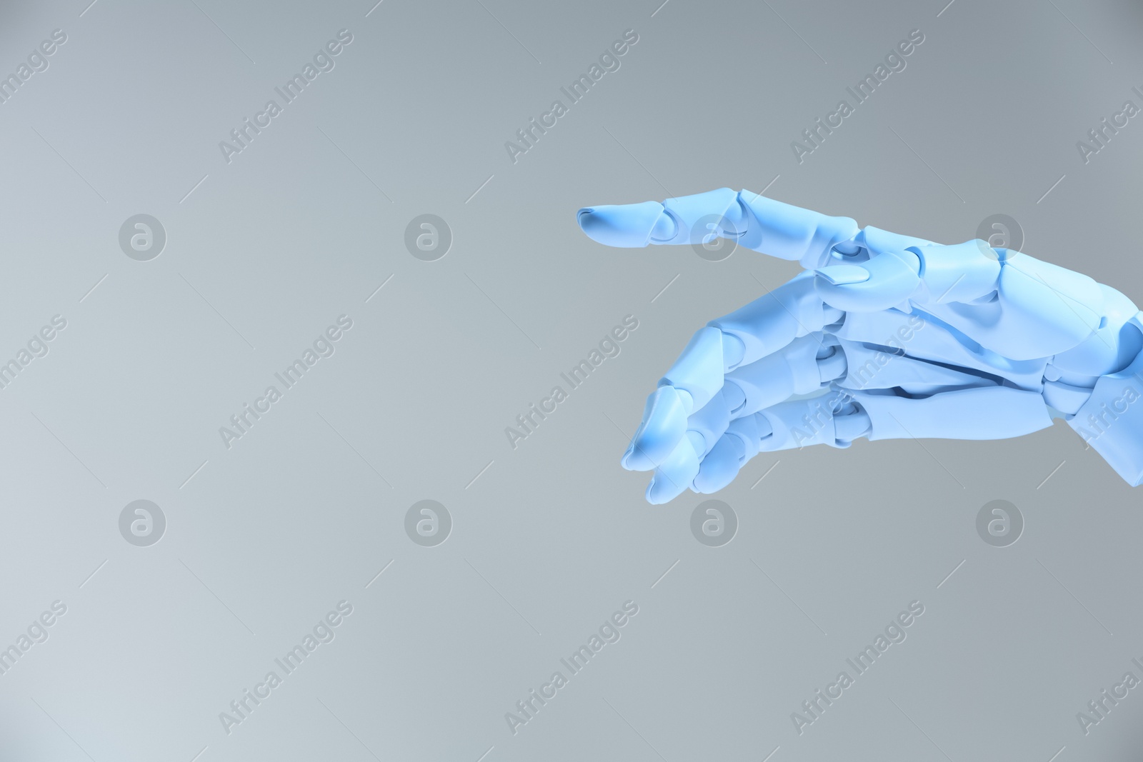 Photo of Artificial intelligence. Robot hand gesturing on grey background, space for text