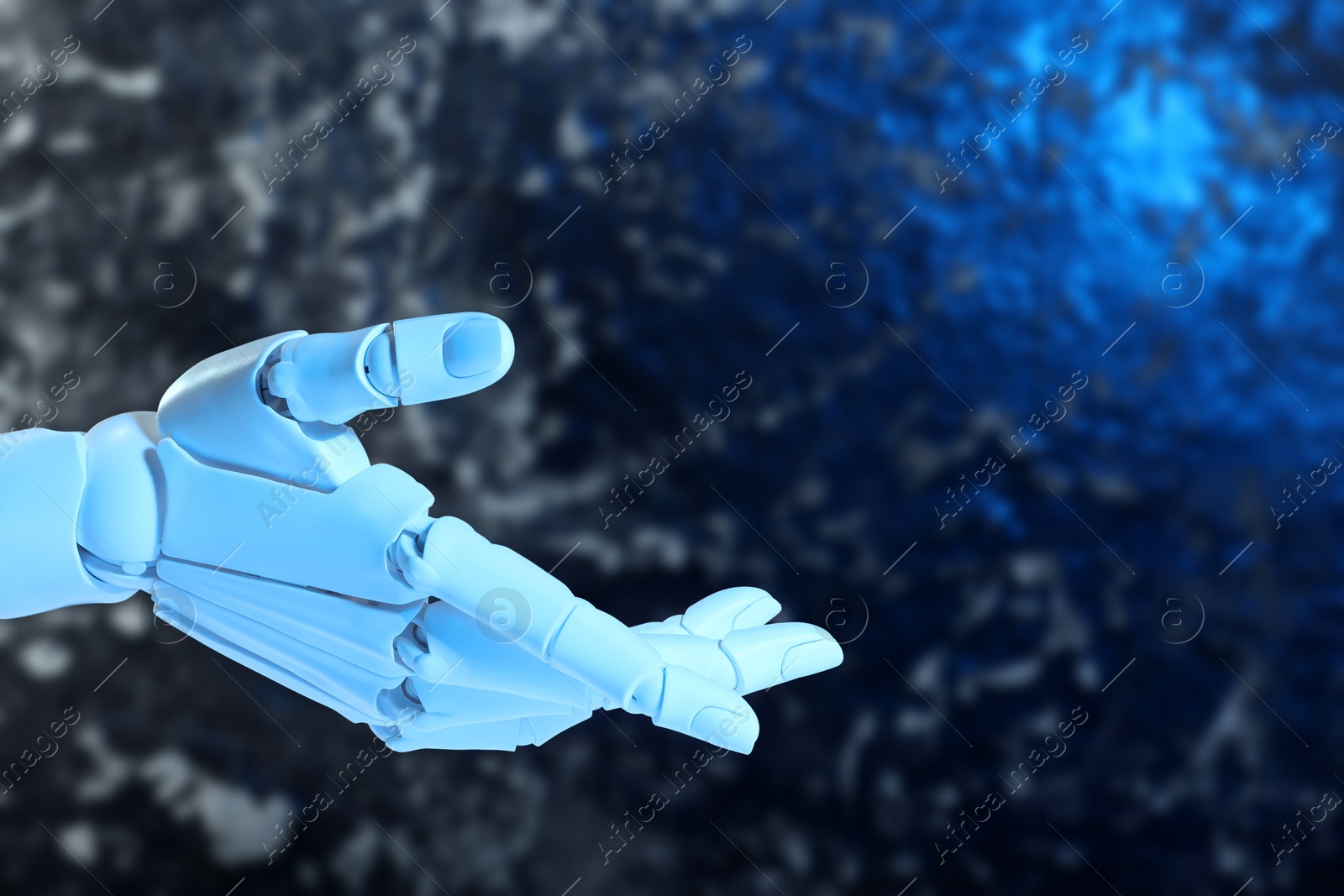 Photo of Artificial intelligence. Robot hand gesturing on blurred background, space for text