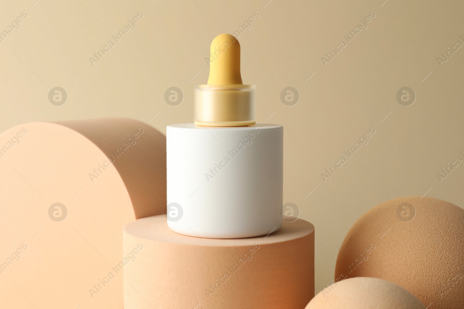 Photo of Stylish presentation of skin care product on beige background