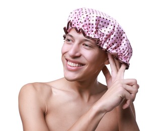 Photo of Happy man wearing pink shower cap on white background