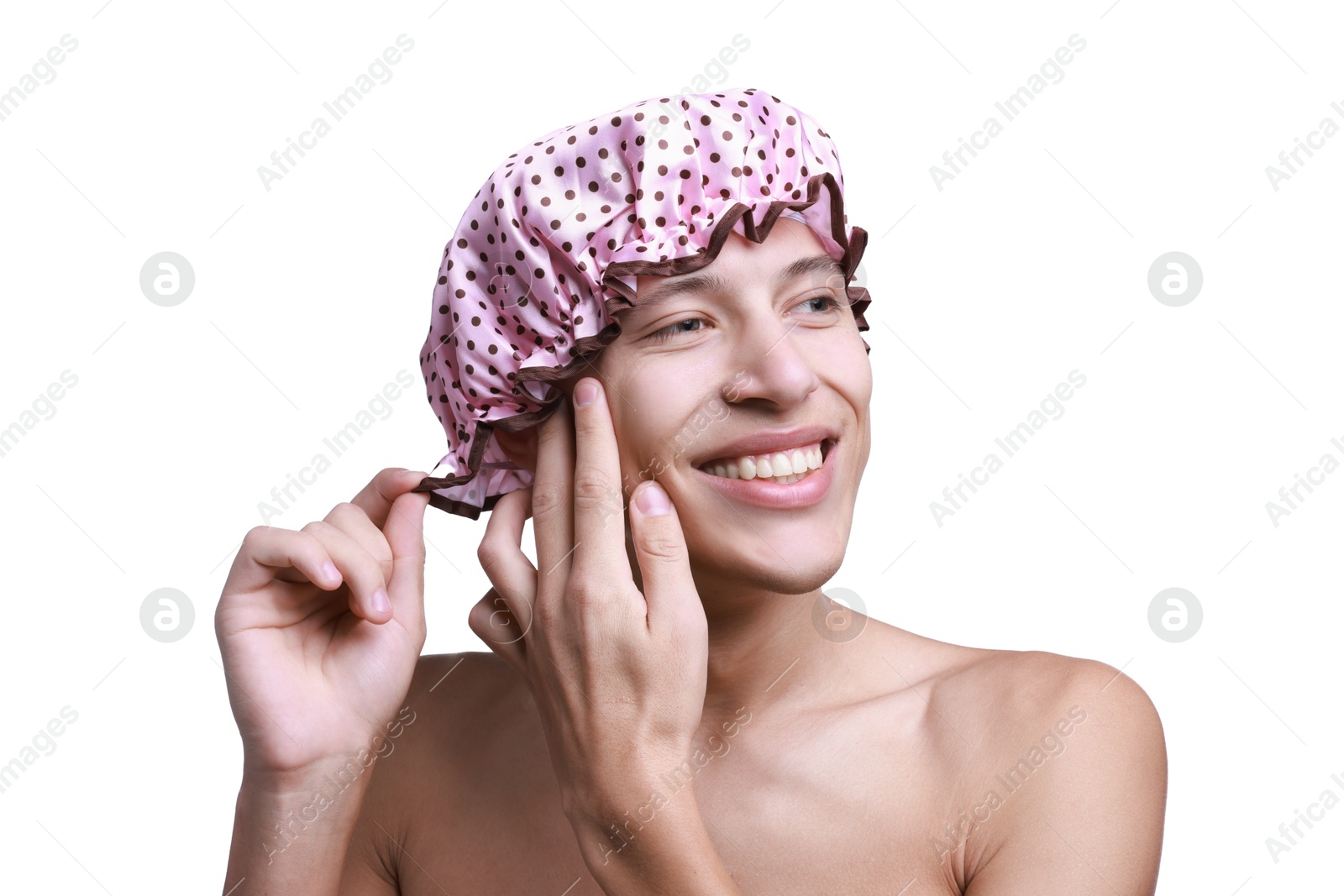 Photo of Happy man wearing pink shower cap on white background