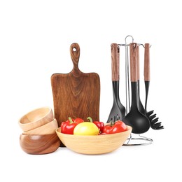 Photo of Different cooking utensils and products isolated on white