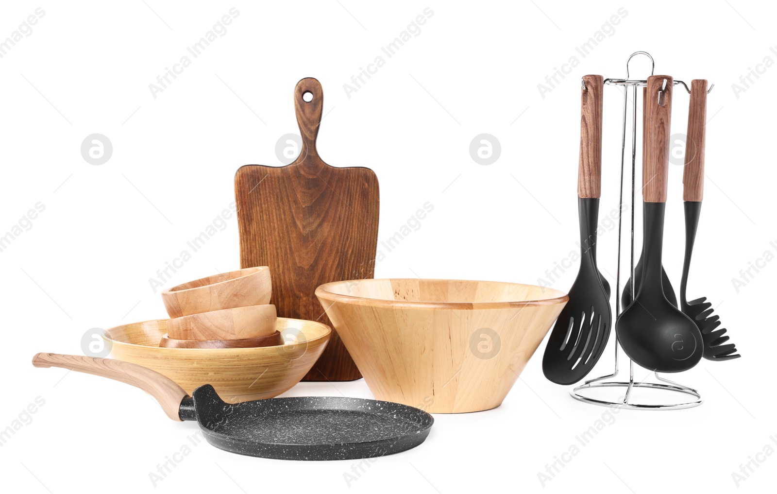 Photo of Set of different cooking utensils isolated on white