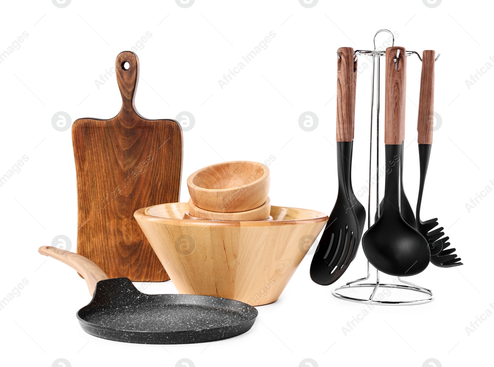 Photo of Set of different cooking utensils isolated on white