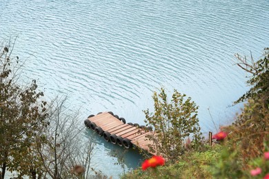 Photo of Beautiful view of river with wooden pier