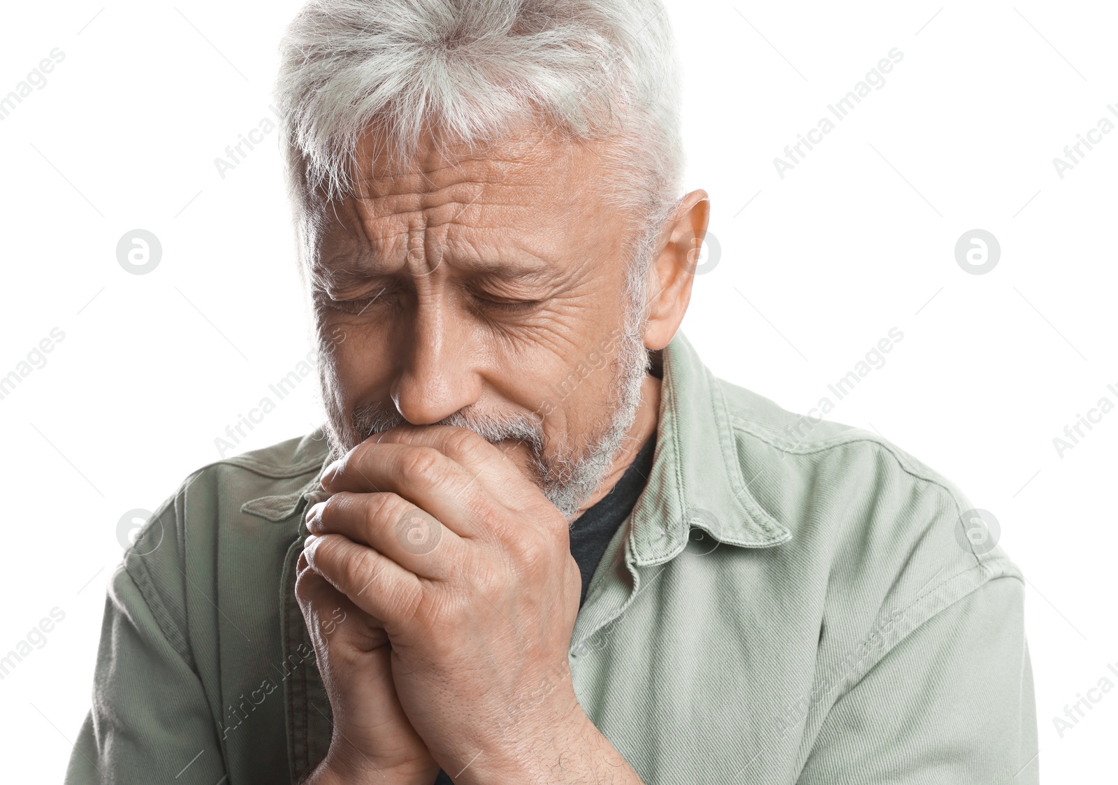 Photo of Sad senior man crying on white background