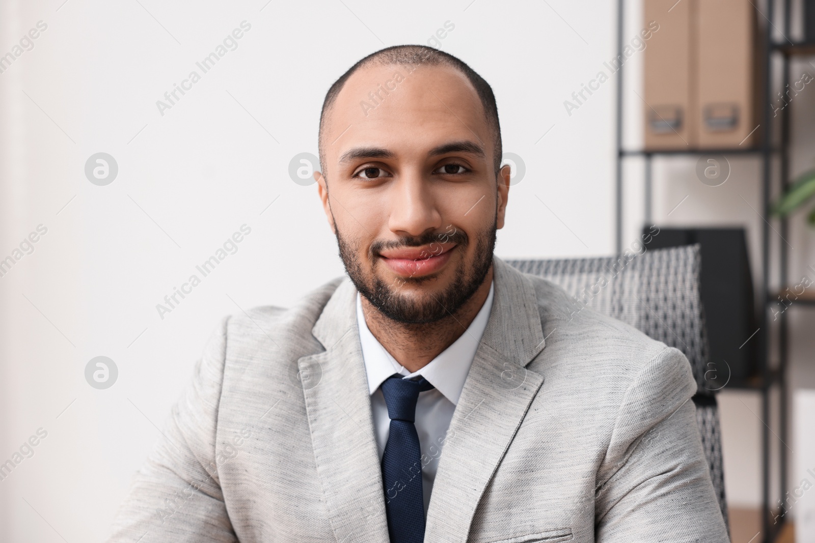 Photo of Portrait of businessman with necktie in office