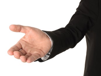 Photo of Offering help. Man reaching his hand on white background, closeup