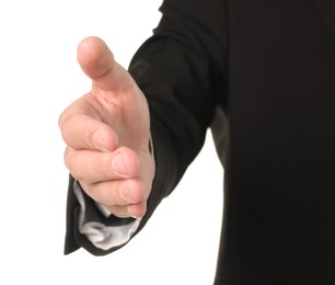 Photo of Offering help. Man reaching his hand on white background, closeup