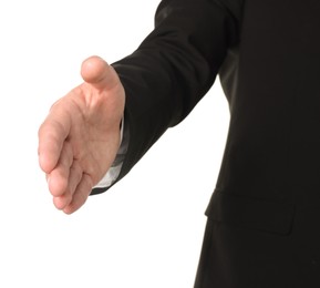 Photo of Offering help. Man reaching his hand on white background, closeup