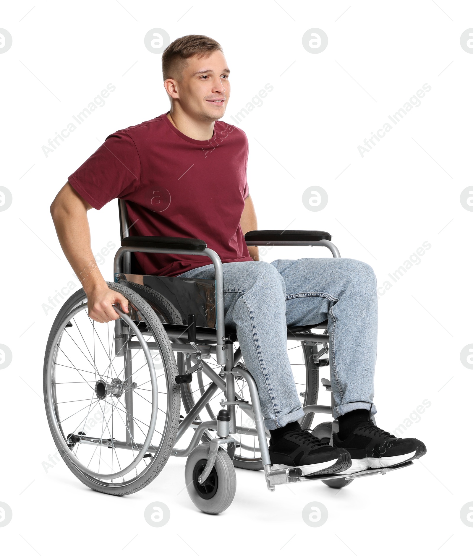 Photo of Smiling man in wheelchair on white background