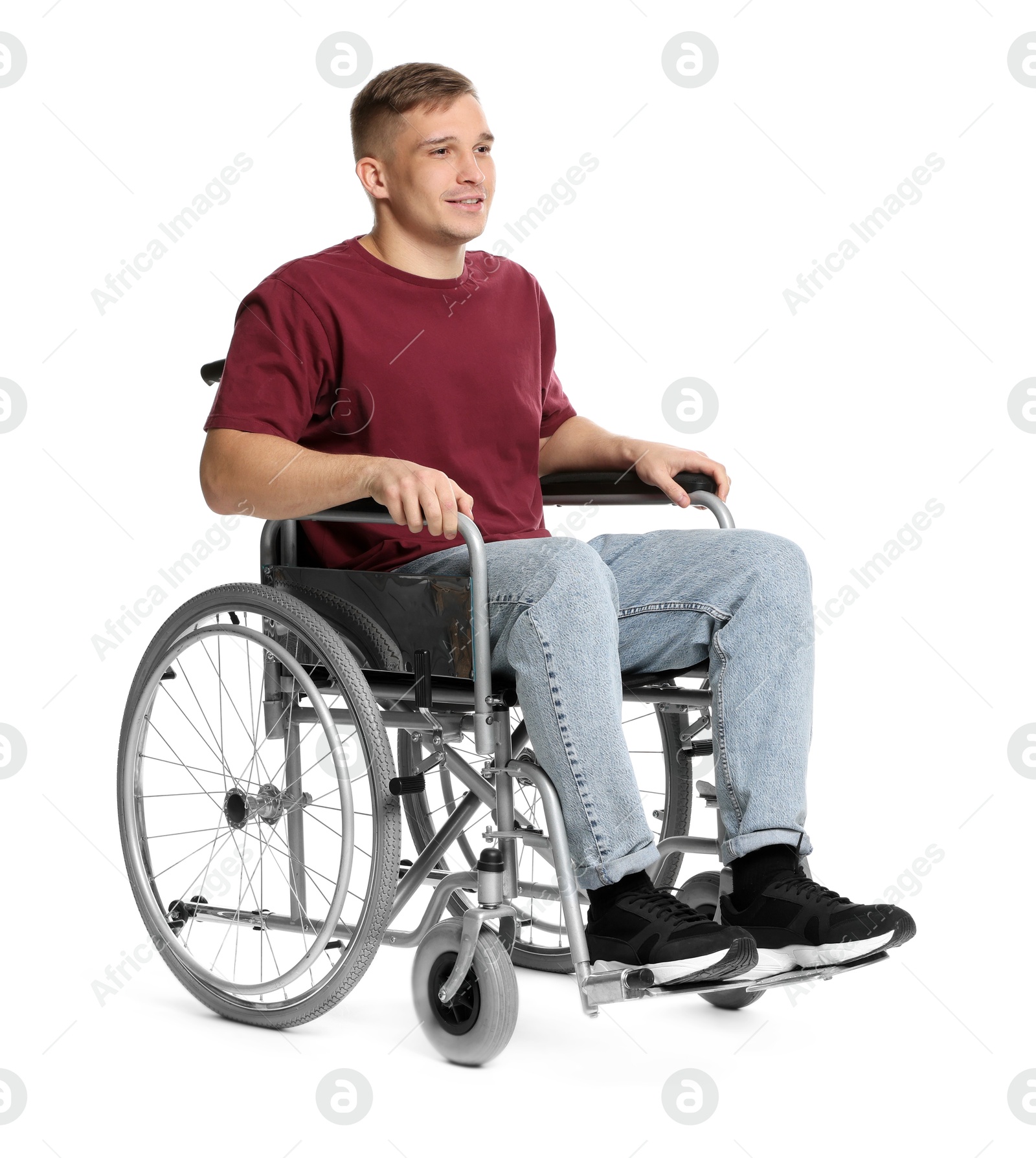 Photo of Smiling man in wheelchair on white background