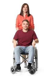 Caregiver with man in wheelchair on white background