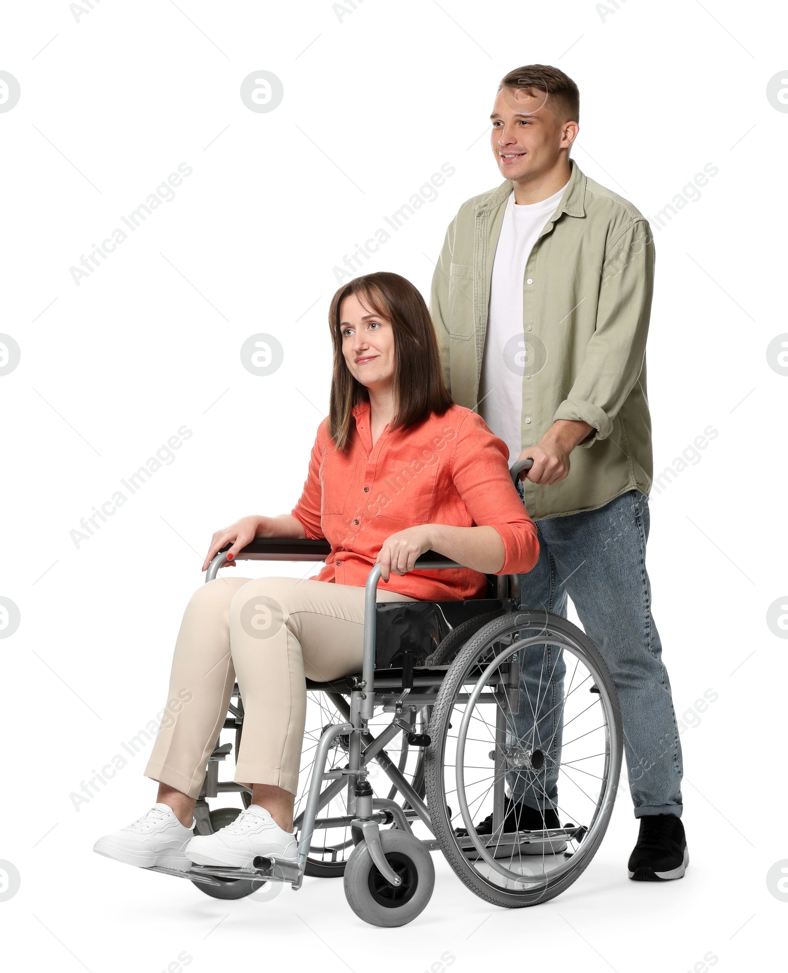 Photo of Caregiver with woman in wheelchair on white background