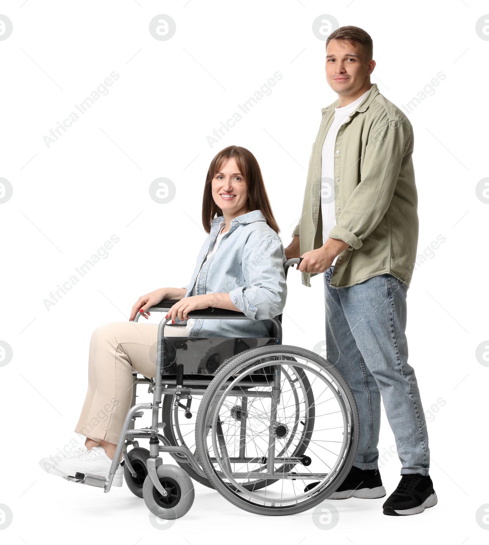 Photo of Caregiver with woman in wheelchair on white background