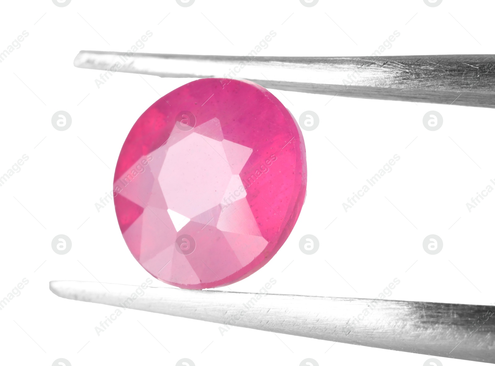 Photo of Tweezers with shiny pink gemstone isolated on white