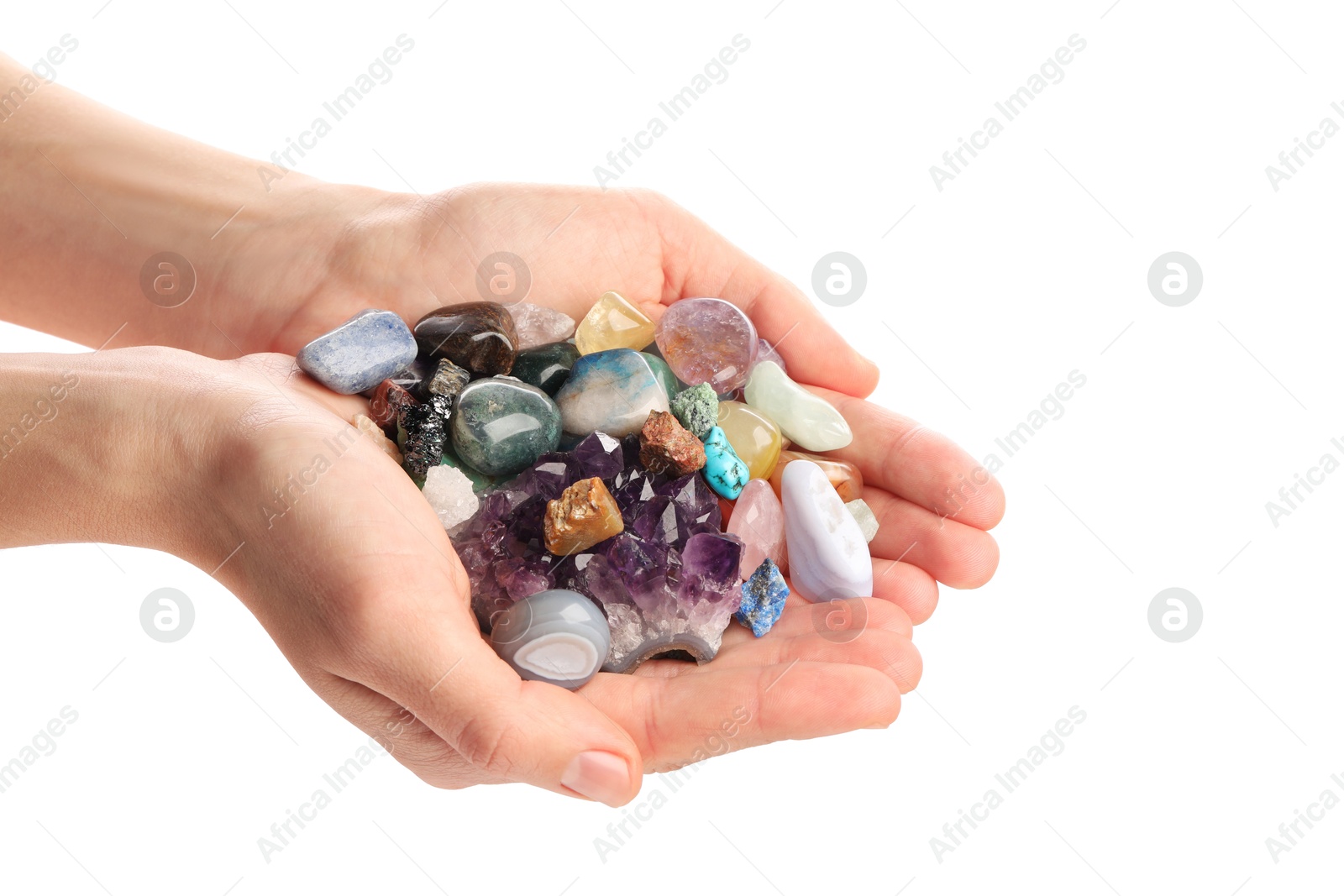 Photo of Woman holding different natural mineral stones on white background, closeup