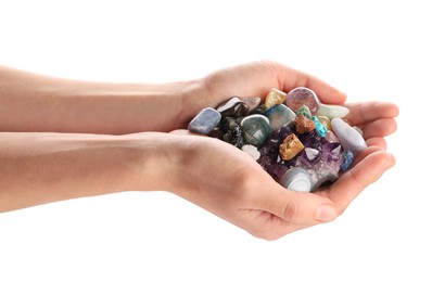 Photo of Woman holding different natural mineral stones on white background, closeup