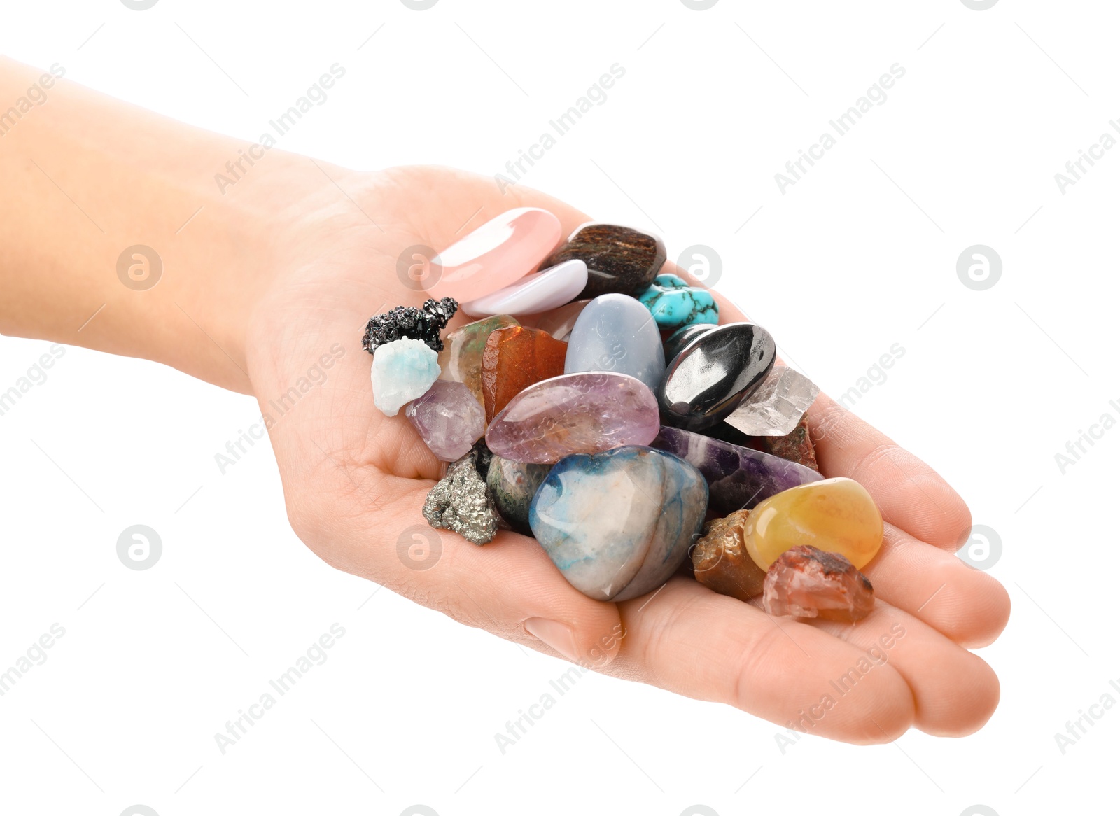 Photo of Woman holding different natural mineral stones on white background, closeup