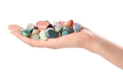 Photo of Woman holding different natural mineral stones on white background, closeup