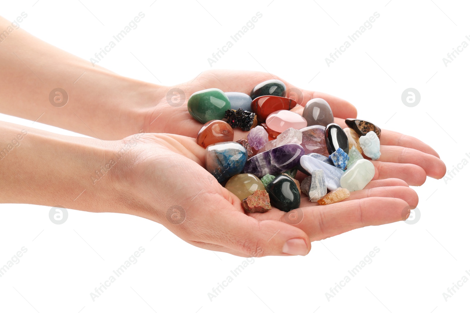 Photo of Woman holding different natural mineral stones on white background, closeup