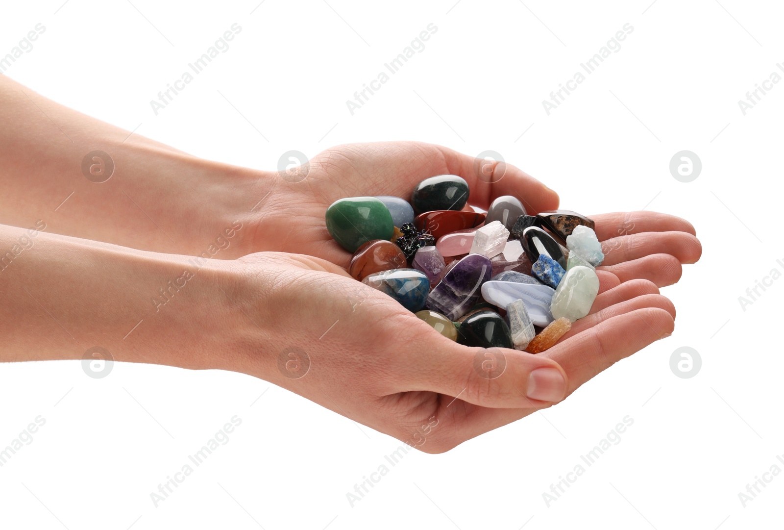 Photo of Woman holding different natural mineral stones on white background, closeup