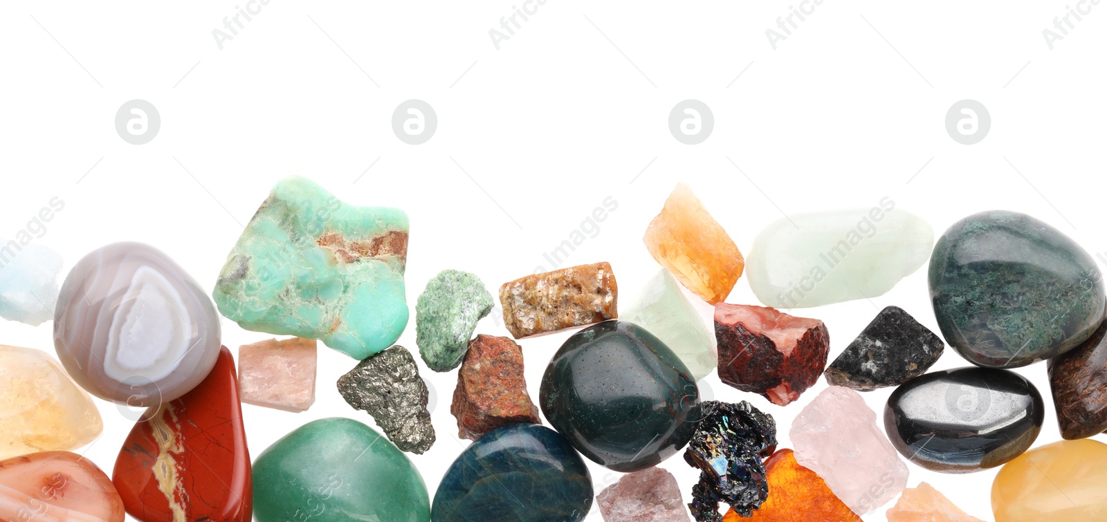 Photo of Different natural mineral stones isolated on white, top view