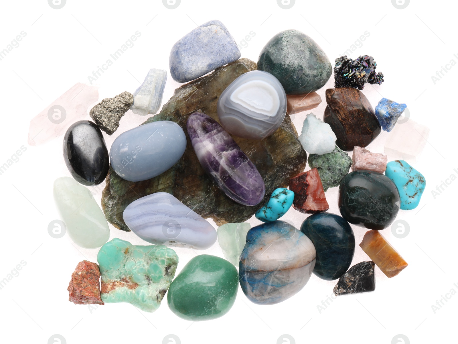 Photo of Pile of different natural mineral stones isolated on white, top view