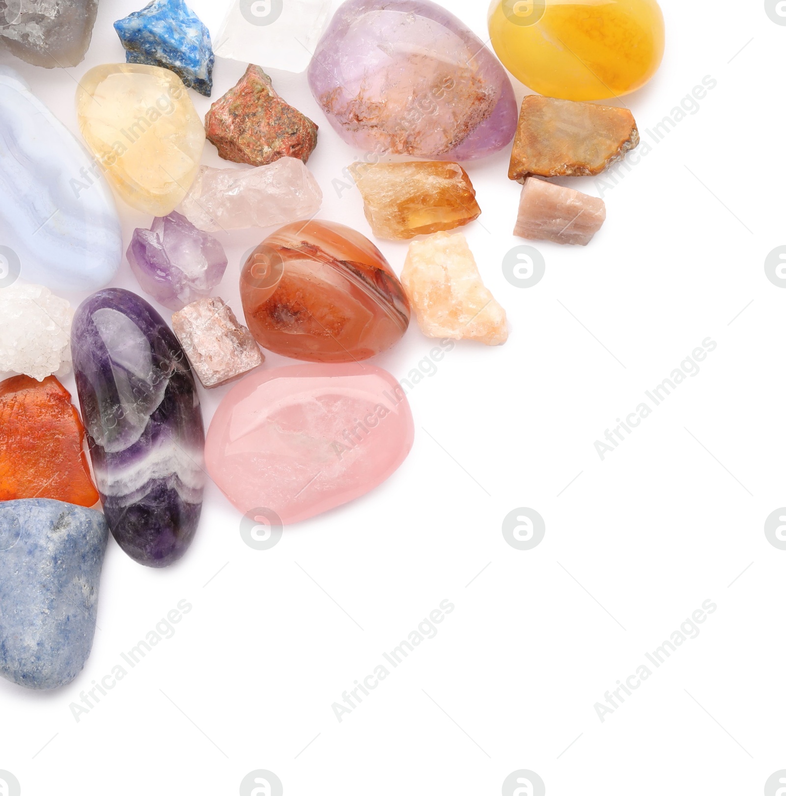 Photo of Different natural mineral stones isolated on white, top view