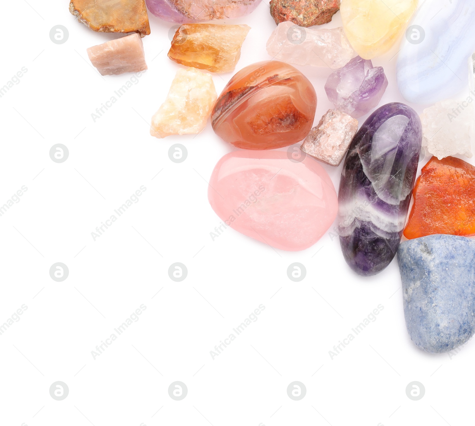 Photo of Different natural mineral stones isolated on white, top view