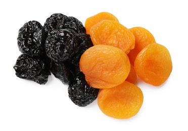 Photo of Dried plums and apricots isolated on white