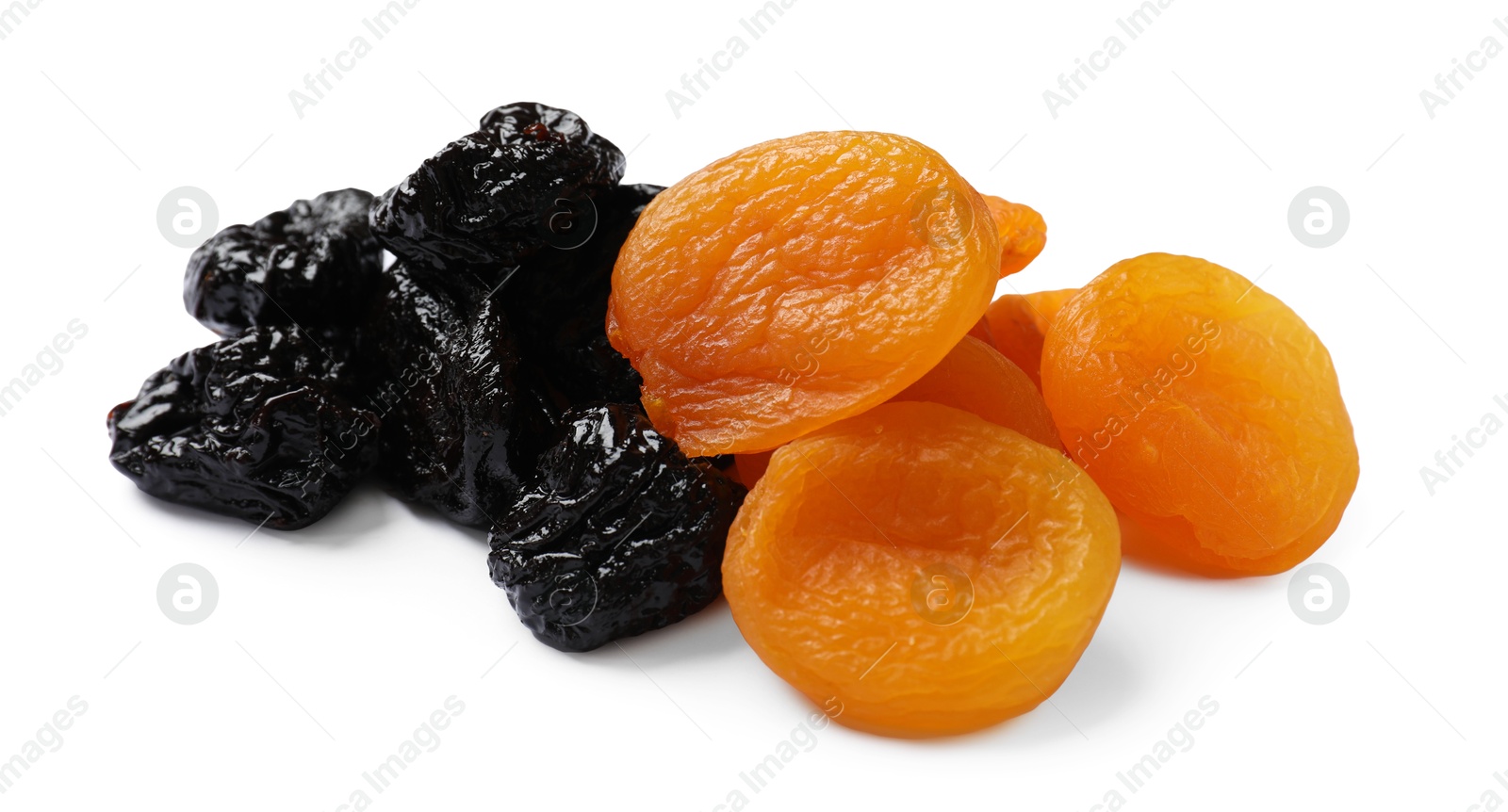 Photo of Dried plums and apricots isolated on white