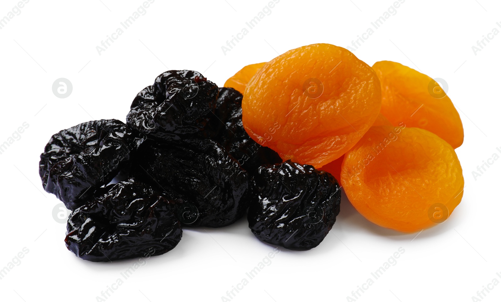 Photo of Dried plums and apricots isolated on white