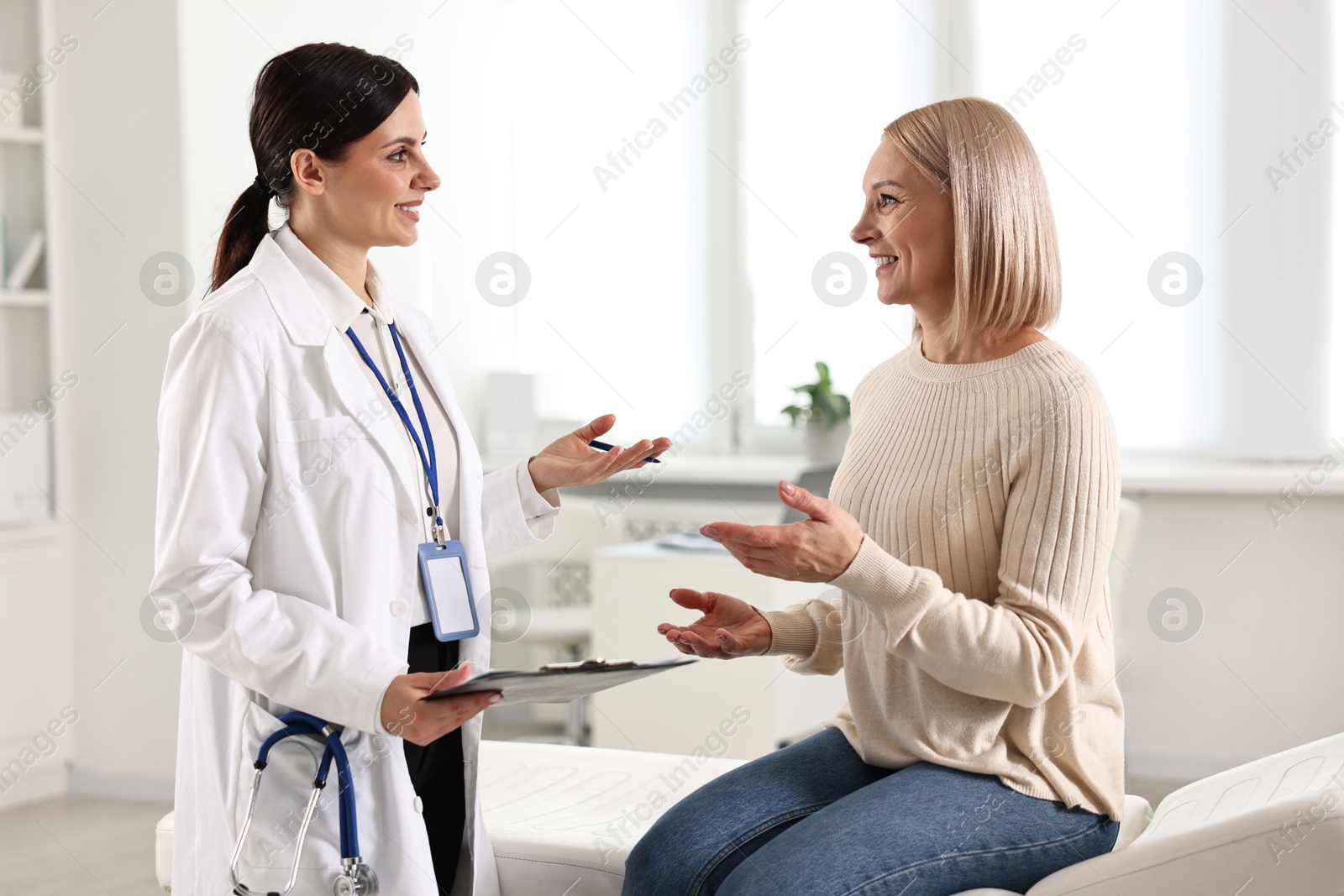 Photo of Woman having appointment with doctor in hospital