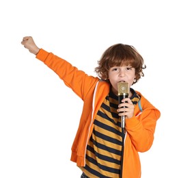 Photo of Little boy with microphone singing on white background