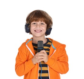 Little boy with microphone and headphones on white background