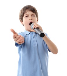 Photo of Cute boy with microphone singing on white background