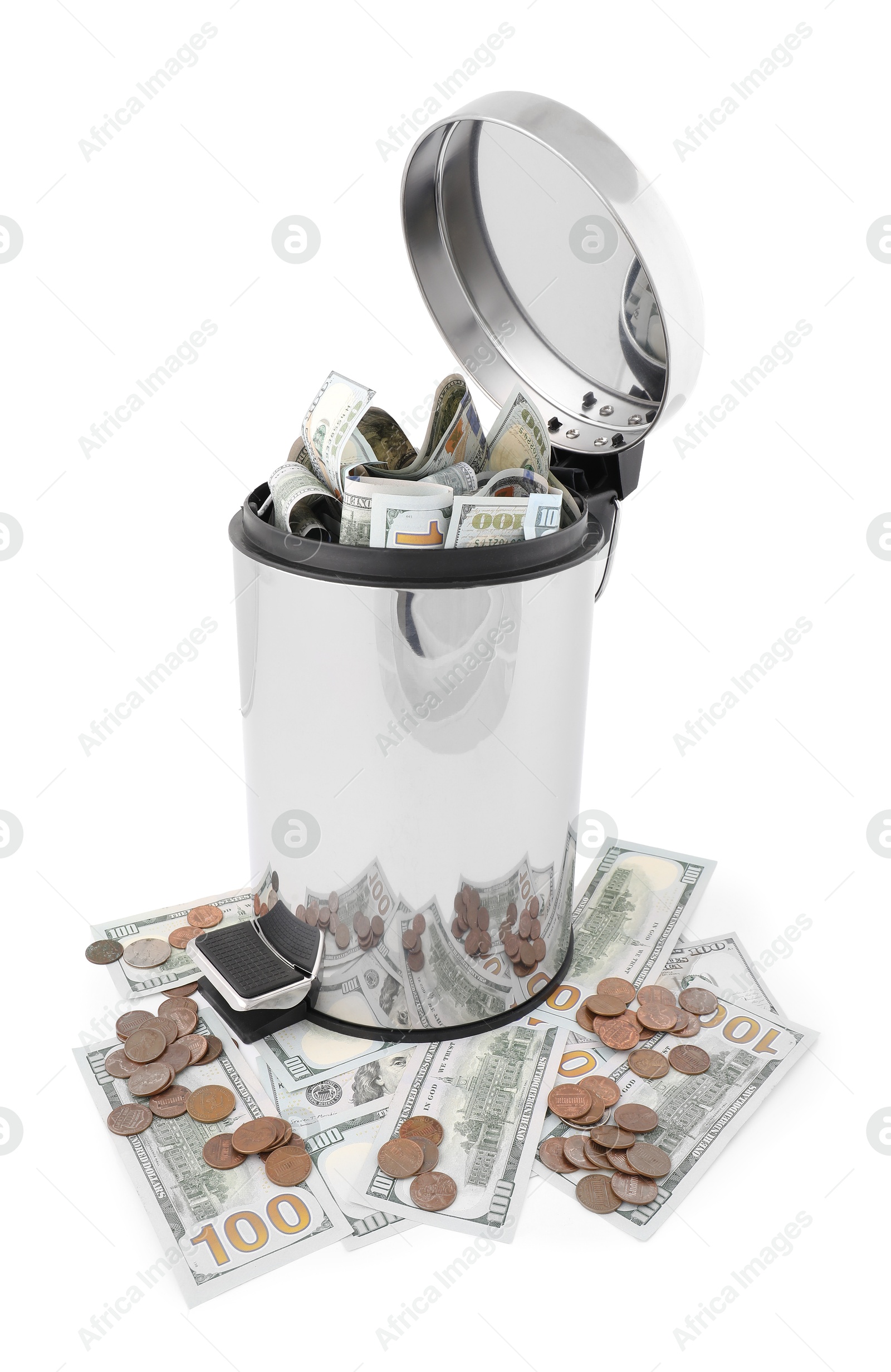 Photo of Dollar banknotes in trash bin and coins on white background