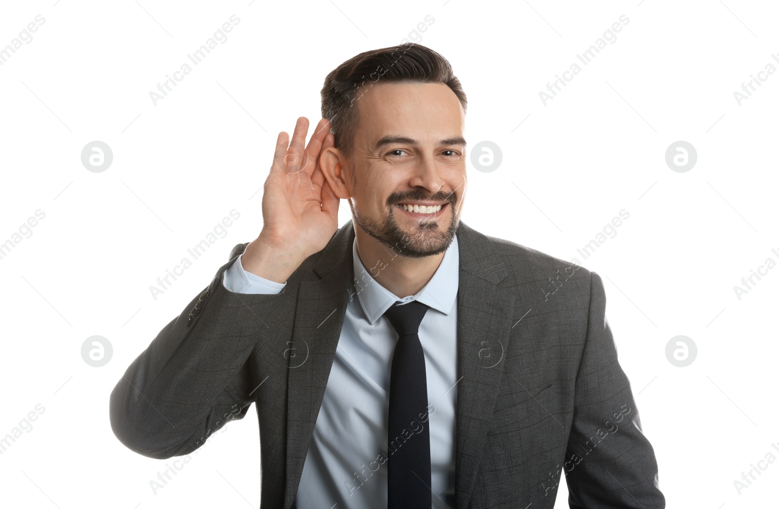 Photo of Man showing hand to ear gesture on white background