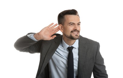 Photo of Man showing hand to ear gesture on white background